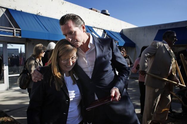 Melissa Caine-Huckabay, project director of the West Contra Costa County Family Justice Center, and Lt. Gov. Gavin Newsom attend a groundbreaking ceremony. The nonprofit 4Richmond helped pull together community partners to support the project. Photo: Lacy Atkins, The Chronicle